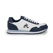 Stijlvolle witte sportieve sneakers met rubberen zool le coq sportif ,...