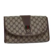 Pre-owned Canvas clutches Gucci Vintage , Brown , Dames