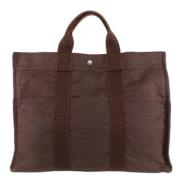 Pre-owned Canvas handbags Hermès Vintage , Brown , Dames