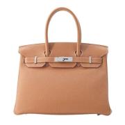 Pre-owned Leather handbags Hermès Vintage , Brown , Dames