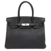 Pre-owned Leather handbags Hermès Vintage , Black , Dames