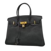 Pre-owned Leather handbags Hermès Vintage , Black , Dames