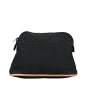 Pre-owned Canvas clutches Hermès Vintage , Black , Dames