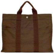 Pre-owned Canvas handbags Hermès Vintage , Brown , Unisex