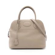 Pre-owned Leather handbags Hermès Vintage , Beige , Dames