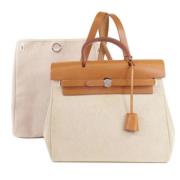 Pre-owned Fabric handbags Hermès Vintage , White , Dames