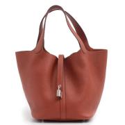 Pre-owned Leather handbags Hermès Vintage , Brown , Dames