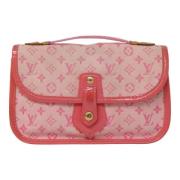 Pre-owned Canvas clutches Louis Vuitton Vintage , Pink , Dames