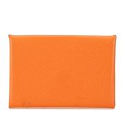 Pre-owned Leather wallets Hermès Vintage , Orange , Dames