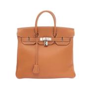 Pre-owned Leather handbags Hermès Vintage , Brown , Dames