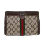 Pre-owned Canvas clutches Gucci Vintage , Beige , Dames