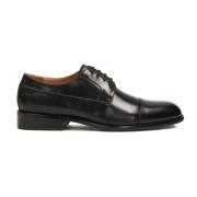 Zwarte leren derby schoenen met neuskappen Kazar , Black , Heren