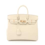 Pre-owned Leather handbags Hermès Vintage , Beige , Dames