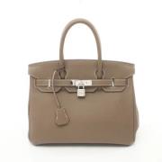 Pre-owned Leather handbags Hermès Vintage , Brown , Dames