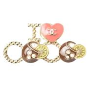 Pre-owned Metal brooches Chanel Vintage , Yellow , Dames