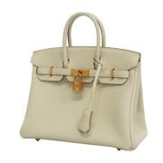 Pre-owned Leather handbags Hermès Vintage , Beige , Dames