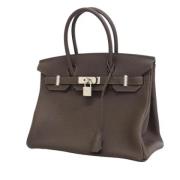 Pre-owned Leather handbags Hermès Vintage , Brown , Dames