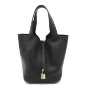 Pre-owned Leather handbags Hermès Vintage , Black , Dames