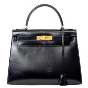 Pre-owned Leather handbags Hermès Vintage , Black , Dames