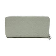 Pre-owned Leather wallets Louis Vuitton Vintage , Gray , Dames