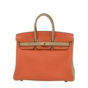 Pre-owned Leather handbags Hermès Vintage , Orange , Dames