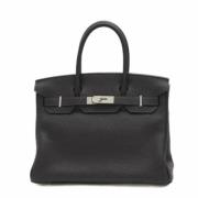 Pre-owned Leather handbags Hermès Vintage , Black , Unisex