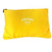 Pre-owned Fabric clutches Hermès Vintage , Yellow , Dames