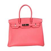 Pre-owned Leather handbags Hermès Vintage , Pink , Dames