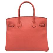 Pre-owned Leather handbags Hermès Vintage , Pink , Dames