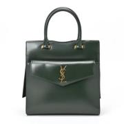 Pre-owned Leather handbags Yves Saint Laurent Vintage , Green , Dames