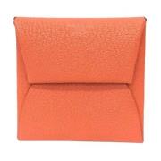 Pre-owned Leather wallets Hermès Vintage , Orange , Dames