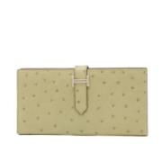 Pre-owned Fabric wallets Hermès Vintage , Beige , Dames