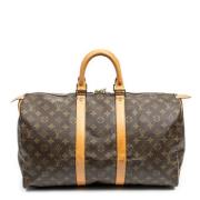 Pre-owned Coated canvas handbags Louis Vuitton Vintage , Brown , Dames