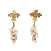 Pre-owned Metal earrings Chanel Vintage , Yellow , Dames