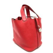 Pre-owned Leather handbags Hermès Vintage , Red , Dames