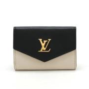 Pre-owned Leather wallets Louis Vuitton Vintage , Beige , Dames