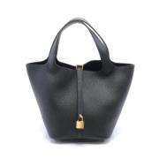 Pre-owned Leather handbags Hermès Vintage , Black , Dames