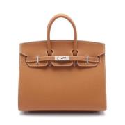 Pre-owned Leather handbags Hermès Vintage , Brown , Dames