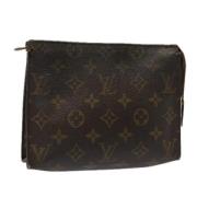 Pre-owned Canvas pouches Louis Vuitton Vintage , Brown , Dames