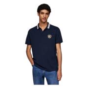 Blauwe Poloshirt met Geborduurd Schild Tommy Hilfiger , Blue , Heren