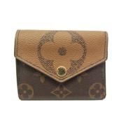 Pre-owned Fabric wallets Louis Vuitton Vintage , Brown , Dames