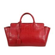 Pre-owned Leather handbags Yves Saint Laurent Vintage , Red , Dames