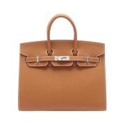 Pre-owned Leather totes Hermès Vintage , Brown , Dames