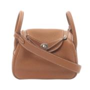 Pre-owned Leather shoulder-bags Hermès Vintage , Brown , Dames