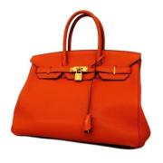 Pre-owned Leather handbags Hermès Vintage , Orange , Dames