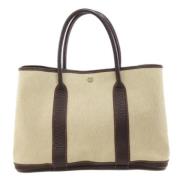 Pre-owned Fabric handbags Hermès Vintage , Beige , Dames