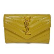 Pre-owned Leather wallets Yves Saint Laurent Vintage , Yellow , Unisex