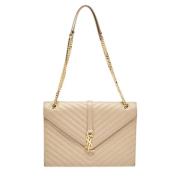 Pre-owned Leather handbags Yves Saint Laurent Vintage , Beige , Dames