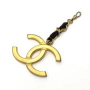 Pre-owned Metal key-holders Chanel Vintage , Yellow , Dames