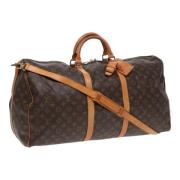 Pre-owned Canvas handbags Louis Vuitton Vintage , Brown , Dames